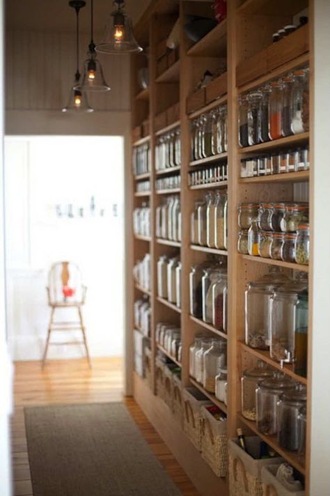 Turn a hallway into a pantry: Clear jars turn spices and snacks into colorful decor that kind of reminds us of a scientist's labratory (in a good way). Kitchen Open Shelf, Desain Pantry Dapur, Beautiful Pantry, Dream Pantry, Deco House, Desain Pantry, Shelves Kitchen, Kabinet Dapur, Kitchen Pantry Design