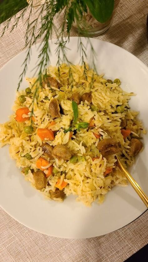 Soya /Nutrela Pulao is a dish that is loaded with veggies and spices which give it a memorable exotic flavour. A spicy, delicious Soya Pulao is an Indian weeknight dinner table favorite, and it comes together quickly with pantry ingredients. Kids love it too!Saffron and caraway seeds are optional which can be added to give this rice preparation a rich aroma, taste and veggies, soya chunks give it a wonderful range of textures. I would suggest to use Basmati rice for great rice meal. A raita lik Beef Pulao, Quinoa Broccoli, Soya Chunks, Sauteed Carrots, Mocha Recipe, Pantry Ingredients, Pulao Recipe, Spring Desserts, Caraway Seeds