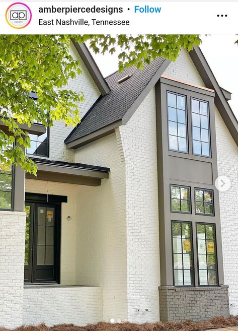 White House With Painted Brick, Red Brick With Taupe Siding, Cream Brick Black Windows, Black Windows Brown Trim, Neutral Outside House Colors, Painted Cream Brick House, Mushroom Colored House Exterior, Urban Bronze Trim Exterior Colors, Traditional Modern Exterior