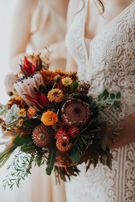 Autumnal bouquet of proteas, banksias, zinnias, leucadendrons for a Bellarine Peninsula Wedding. Photo by: Love Wilder Australian Native Wedding, Autumnal Bouquet, Native Bouquet, Native Wedding, Rustic Beach Wedding, Australian Flowers, Protea Flower, Australian Native Flowers, Bouquet Inspiration