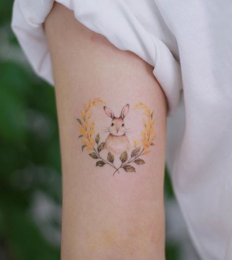 Bunny and flowers (Bunny means her and golden rod means her mother🌿) #flowertattoo #bunnytattoo #goldenrod #watercolortattoo #koreatattoo… Hase Tattoos, Bunny Tattoo, Rabbit Tattoo, Flower Tattoo Meanings, Bunny Tattoos, Rabbit Tattoos, Muster Tattoos, Meaningful Tattoos For Women, Small Meaningful Tattoos