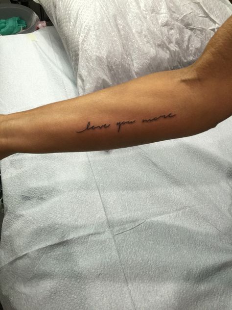 love you more  (tattoo#3) I Love You More Tattoo With Flower, Tattoos With The Word Love, Love You More Arm Tattoo, Love You More Tattoo Forearm, I Love You More Cursive Tattoo, Lay All Your Love On Me Tattoo, I Love You So Much Tattoo, Love You More Fine Line Tattoo, More Love Tattoo