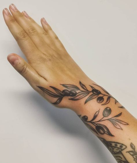 Olive Branch Tattoo Sleeve, Olive Tree Branch Tattoo Wrap Around, Olive Leaf Tattoo Arm, Greek Plant Tattoo, Branch Wrap Around Tattoo, Olive Branch Wrap Tattoo, Olive Plant Tattoo, Olive Branch Hand Tattoo, Olive Branch Wrap Around Tattoo