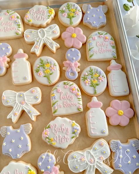 Baby in bloom 💐🍼✨ Pricing? 👉🏻 https://msha.ke/alecreations918 • • • • #alecreations918 #tulsasmallbuisness #tulsaoklahoma #decoratedsugarcookies #customcookies #cookie #cookies #inspirationcookies #cookiesofinstagram #desserts #dessertporn #dessertideas #partyideas #party #sugarcookies #royalicing #royalicingcookies #cookies #cookiesideas #royalicingideas #dessert #desserttable #babyshowercookies #babyshowerideas #babyshowerdecor #babyshowerparty #babyinbloom #babyinbloomcookies #babyinbloomb... Baby Shower Ideas April, Baby In Bloom Treats, Baby In Bloom Shower Ideas Food, Baby In Bloom Dessert Table, Baby In Bloom Cookies, Pop Cupcakes, Baby Shower Theme Decorations, Baby Shower Deco, Baby In Bloom