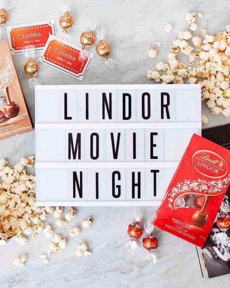 Lindt Chocolate Canada on Instagram: "Friday night = movie night 🍿 Movie night is a great way to wind down after a busy week. Throw a cozy blanket and some big pillows on the floor, slip on some slippers, smell the popcorn popping away in the kitchen and don’t forget the LINDOR Truffles, the ‘pièce de résistance’!" Popcorn Popping, Lindor Truffles, Night Movie, Lindt Lindor, Lindt Chocolate, Big Pillows, Custom Content, Cozy Blankets, Movie Night