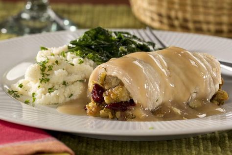 Stuffed Turkey Breast Dinner | MrFood.com Turkey Breast Cutlets, Herbed Turkey, Pot Roast Dinner, Turkey Cutlet Recipes, Instant Pot Roast, Stuffed Turkey Breast, Thanksgiving Entree, Cutlet Recipes, Turkey Roll