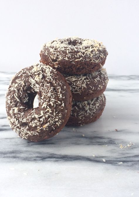 Chocolate Coconut Donuts are light, chocolatey and have just a hint of coconut. Better than from the donut shop, and they're baked too! Coconut Donut, Donut Chocolate, Baked Donut, Baking Recipe, Homemade Donuts, Here's The Thing, Baking Blog, Baked Donuts, Donut Shop