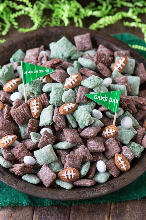 Football Puppy Chow in a Serving Plate Superbowl Snacks Dessert, Football Snack Food, Super Bowl Snack Recipes, Football Desserts, Superbowl Desserts, Football Party Foods, Healthy Superbowl Snacks, Puppy Chow Recipes, Bowl Party Food