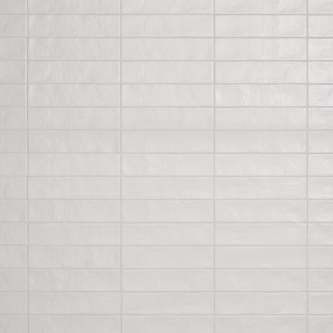 For an elevated look to your design, choose the Matte White Brick Ceramic Tile with a matte finish. Use this white tile to add new visual interest in any space like the bathroom, kitchen, living room, and more. Ceramic tile is versatile and easy to install. It can be used in indoor areas from living rooms to kitchens, and it can be easily cleaned and maintained. The rectangle is a classic shape and now comes in more contemporary colors and sizes. The Matte White Brick Ceramic Tile is versatile i White Glazed Tile Backsplash, White Tile Master Bath, Unique Subway Tile Patterns, Large White Subway Tile Bathroom, White Shower Wall Tile, White Tile Backsplash Kitchen, Matte White Subway Tile, Modern Shower Tile Ideas, White Subway Tile Kitchen Backsplash