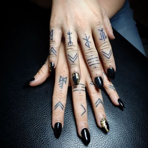 30+ Rune Tattoo Ideas That Incorporate Norse Mythology - Tattoo Inspo Hub Viking Finger Tattoo Symbols, Finger Rune Tattoos For Women, Runes Tattoo Men, Viking Protection Symbol Tattoo, Small Sigil Tattoo, Nordic Finger Tattoos For Women, Viking Finger Tattoo For Women, Small Norse Tattoos For Women, Rune Finger Tattoos For Women