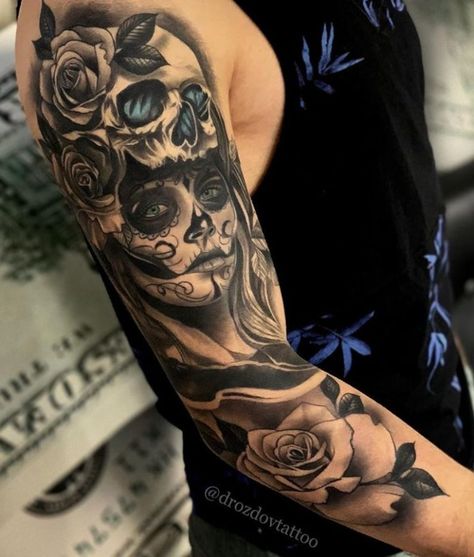 The Best Sleeve Tattoos Of All Time - TheTatt Upper Arm Skull Tattoo, Upper Arm Sleeve Tattoos For Guys, Half Sleeve Tattoos For Men Upper Arm, Dead Tattoo, Catrina Tattoo, Skull Girl Tattoo, Skull Sleeve Tattoos, Skull Sleeve, Cool Arm Tattoos