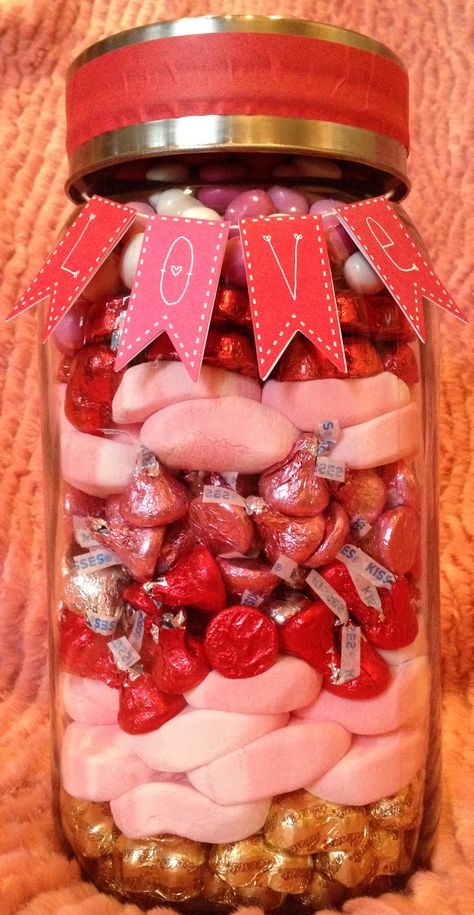 How many total pieces of candy are in this large jar?  Guess the number for our Valentines Candy Contest 2014 and WIN your choice of this jar with candy OR a signed copy of "Jury Nullification" written by our own Clay Conrad!  The jar measures 11 1/2" tall and the lid is 4 3/4" round (diameter).  The first person submitting the correct answer wins.  Enter once a day AND ONLY ONCE A DAY as often as every day on our Facebook page from now until midnight (central time) February 13, 2014. Valentine Candy Salad Jar, Guess The Candy In The Jar, Guessing Jar Ideas, Valentines Dental, Valentine Jars, Guessing Jar, Orthodontics Marketing, Jar Games, Candy Guessing Game