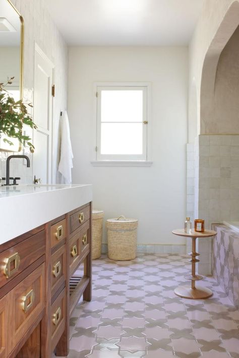 HGTV loves this Spanish-style bathroom with marble tile. California Spanish Bathroom, Master Bath Spanish Tile, Spanish Revival Master Bath, Spanish Tiles Bathroom, Bathroom With Marble Tile, Spanish Bathroom Hacienda Style, Spanish Colonial Floor Tile, Modern Spanish Style Bathroom, Spanish Sink Bathroom