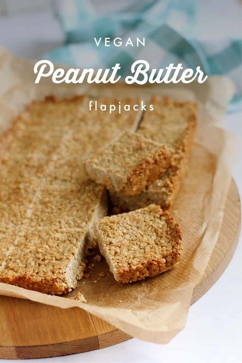 Easy 5 ingredient peanut butter flapjacks made and baked in under 30 minutes. These vegan flapjacks are salty-sweet thanks to the peanut butter and crunchy demerara sugar, syrupy, and oh so moreish. Perfect for after-school snacks, lunchboxes, as well as grab and go breakfasts. Peanut Butter Flapjack, Batch Cooking Recipes, Best Ever Brownies, Demerara Sugar, Ice Cream For Breakfast, Quick Baking, Fudgy Brownie Recipe, Freezable Meals, Peanut Butter Roll