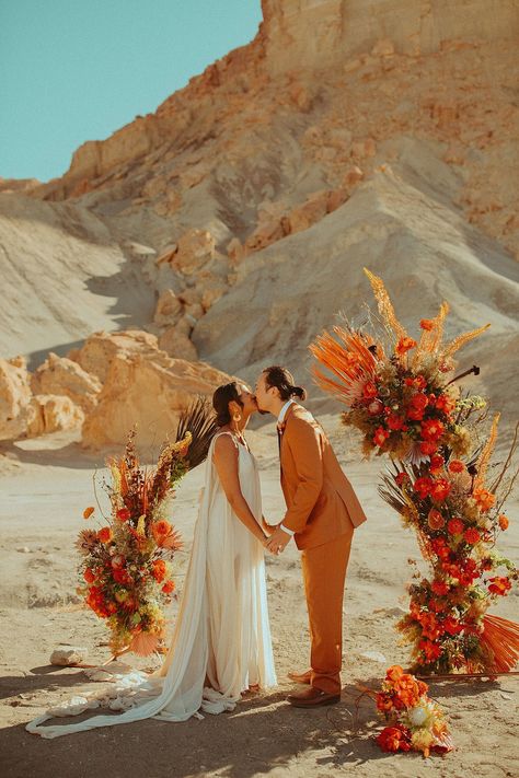 Amangiri Elopement, Desert Floral Ceremony Arch, Utah Elopement Photography, Desert Elopement Inspiration, Orange Groom Suit, Edgy Florals, Black Palm Wedding Florals Orange Groom Suit, Elopement Arch, Orange Weddings, Elopement Desert, Floral Ceremony, Floral Archway, Palm Wedding, Utah Elopement, Desert Elopement