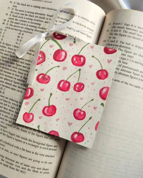 bookmarks for summer??🍓💌🍒 Dm to buy Paper: 300 gsm Size: 3" * 6" [aesthetic, aesthetic paintings, aesthetic bookmarks, aesthetic bookmarks for sale, girly bookmarks, pink bookmarks, aesthetic bookmarks for summer, cute bookmarks, strawberry bookmarks, cherry bookmarks, bookmarks for sale, custom bookmarks] #aesthetic #aestheticart #aestheticartworks #aestheticbookmarks #bookmarksofinstagram #bookmarksforsale #moonbookmarks #ribbons #couquette #bookmarkshop Handmade Aesthetic Bookmarks, Book Mark Ideas Creative Aesthetic Cute, Cute Bookmarks Handmade Aesthetic, Coquette Bookmark Diy, Pink Bookmark Ideas, Bookmarks Aesthetic, Paintings Aesthetic, Aesthetic Bookmarks, Girly Bookmarks