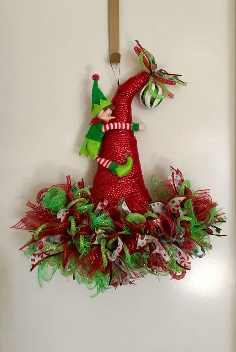 Elf Hat wreath Elf Hat Wreath Diy, Elf Wreaths Deco Mesh, Hat Wreaths For Front Door, Elf Wreath Ideas Diy, Witches Hat Wreath Diy, Christmas Hat Wreath, Elf Hat Wreath, Christmas Wresth, Elf Wreaths