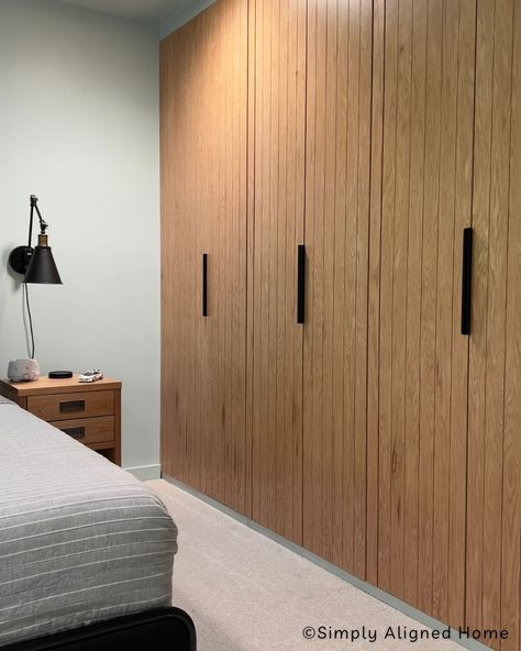 Discover the beauty of custom slatted doors in our IKEA Pax closet hack. Elevate your wardrobe space with this stylish DIY project! Front Closet Door Ideas, Ikea Pax Japandi, Closet Ikea Pax, Ikea Closet Doors, Ikea Pax Doors, Ikea Pax System, Ikea Wardrobe Hack, Modern Closet Doors, Pax Hack