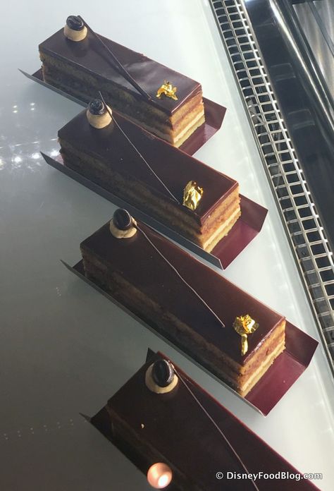 Opera Cake Design, Chocolate Opera Cake, Phantom Of The Opera Desserts, Cake Opera Co, Opera Cake, Disney Food Blog, Disney Springs, Disney Food, Magical Places