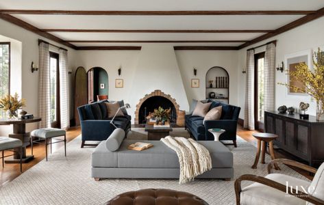 A 1924 Washington Tudor In Medina Gets A Fairy Tale Update - Luxe Interiors + Design Wood Sunburst, Seattle Interior Design, Beautiful French Doors, Tudor Home, Storybook Homes, Mid Century Furnishings, White Subway Tile Backsplash, Tudor House, Bentwood Chairs