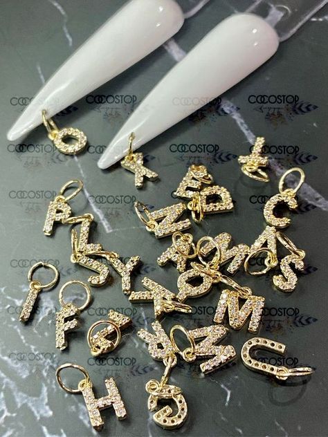 91.Don't miss out on the latest nail trends! Click link for all the juicy details! #nails #nailtools #nailtrend Dangling Nail Charms, Nail Dangle Charms, Letter Charms On Nails, Nails With Dangle Charms, Cosmetology Kit, Nails Matching, Nail Polish Gift Set, Press On Toenails, Nail Polish Holder