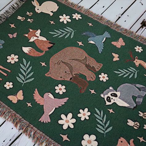 Transform your space into a cozy woodland retreat with our adorable Woodland Animal Woven Throw Blanket! 🌿🦊 Perfect for adding a touch of nature-inspired charm to your home decor or creating a whimsical ambiance in a nursery or kids' room. Crafted with love and attention to detail, this cozy blanket features a delightful design adorned with charming woodland animals amidst lush greenery and enchanting forest flowers. Whether you're snuggling up on chilly nights or decorating a cozy nursery for Woodland Nursery Blanket, Room Decor Maximalist, Forest Nursery Theme, Woodland Animals Nursery, Woodland Retreat, Nature Home Decor, Home Decor Cozy, Enchanting Forest, Cozy Nursery