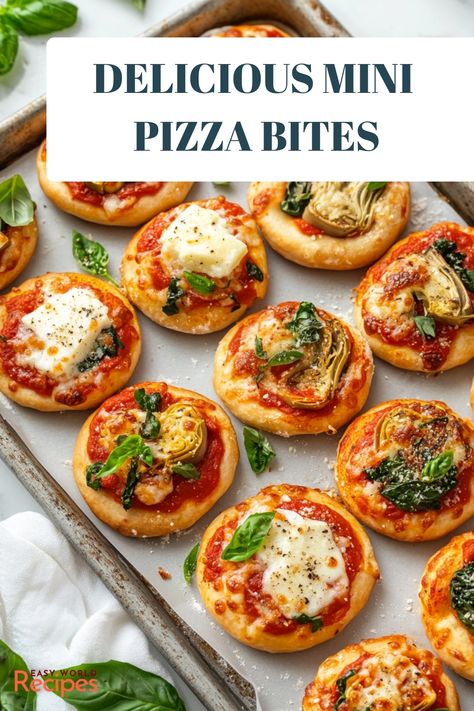 Make delicious mini pizzettas with a simple homemade pizza dough, topped with tomato sauce, cheese, and fresh basil. Customize your bite-sized pizzas with endless topping options like pepperoni, olives, and artichokes. Christmas Mini Pizzas, Mini French Bread Pizza, Finger Foods Pizza, Mini Pizza Appetizers Finger Foods, Finger Food Pizza, Mini Italian Appetizers, Mini Pizzas For Party, Mini Pizza Cups, Homemade Finger Foods