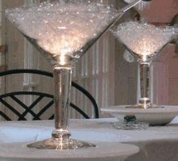 Martini Glass Vases  10"  Grande Martini  48 ounce $11 each/ 3 for $10 each Martini Centerpiece, Martini Glass Centerpiece, Cake Martini, Quinceñera Ideas, Old Hollywood Theme, Expo Ideas, Martini Party, Floating Candles Bowl, Old Hollywood Wedding