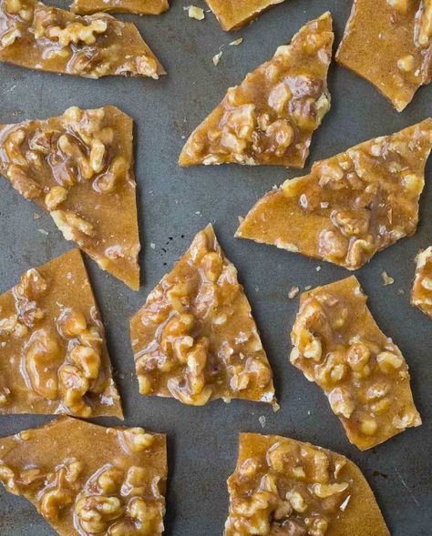 Perfect for gift giving or snacking on at parties, this Walnut Brittle with Cinnamon and Cloves is easy to make and so flavorful thanks to toasted walnuts and warm spices.  I’m partnering with California Walnuts to bring you a year of nutty and delicious walnut recipes. This post is sponsored by California Walnuts, but all opinions are my own. I'm a little obsessed with cloves right now. They're so warm and cozy and perfect for the holiday season. Ever since I tasted those coffee cooki Walnut Brittle, Fruity Pebbles Treats, Brittle Recipes, Walnut Recipes, Candy Recipes Homemade, Fruity Pebbles, Toasted Walnuts, Peanut Butter Recipes, Homemade Candies