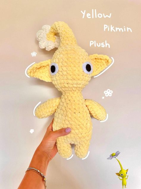 Meet my crochet Pikmin! Super cute and perfect for snuggling, to add to your collection, or as a gift. From his feet to the tip of his flower, he stands at around 20 inches tall.  All Pikmin will be made to order. Please feel free to message me with any questions or concerns💛 Crochet Pikmin Pattern, Crochet Ideas Easy Cute, Maximalist Crochet, Crochet Tweety Bird, Funny Things To Crochet, Yellow Crochet Projects, Crochet Patterns Stuffed Animals, Pikmin Crochet, Silly Crochet