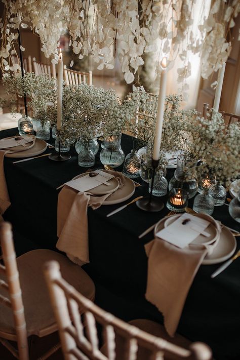 wedding table decor with gypsophila stams in glass bottles, black table cloth and beige tableware and linens | Esther Louise Triffitt Photography Black Table Linens Wedding, Black Tablecloth Wedding, Black Table Cloth, Black Wedding Table, Blue Colour Scheme, Decorated Table, Gypsophila Flower, Black Tablecloth, Country House Wedding Venues