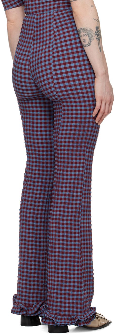 Stretch recycled polyester-blend seersucker trousers. Check pattern throughout. · Ruffled trim at cuffs · Concealed zip closure at side Supplier color: Racing red Checked Outfit, Clothes Pieces, Blue Plaid Pants, Fancy Lady, Luanna Perez, Check Trousers, Raspberry Ripple, Checked Trousers, Autumn 2024