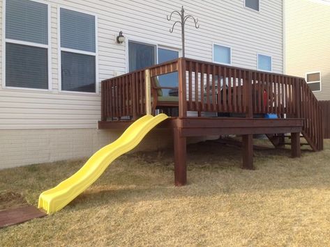 Slide Off Porch, Deck With A Slide, Slide On Deck, Under Deck Play Area Kids, Slide Off Of Deck, Slide Off Deck, Play Set Landscaping, Deck With Slide, Deck Playground