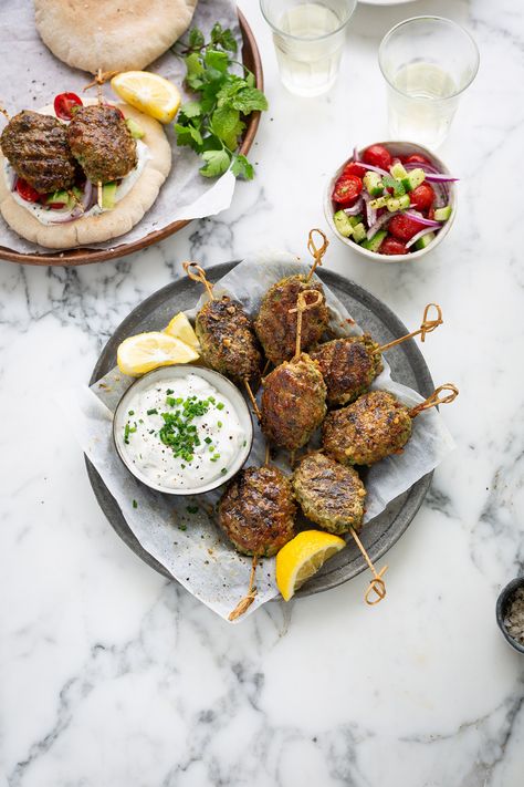 Herby lamb koftas with yoghurt sauce recipe | Drizzle and Dip Koftas Lamb, Greek Yogurt Sauce For Lamb, Lamb Pitas With Yogurt Sauce, Lamb Gyros With Tzatziki Sauce, Lamb Pita Tzatziki, Lamb Koftas, Cumin Lamb, Savory Meatballs, Hummus And Pita