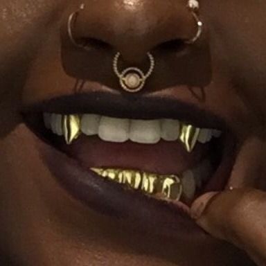 Piercing Black Women, Grillz Teeth, Tooth Gems, Catty Noir, Tooth Gem, Gold Teeth, Teeth Jewelry, Aragon, Coven