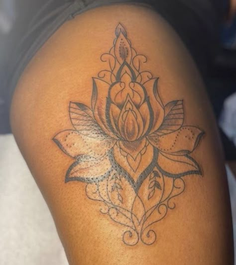 Flower Tattoos On Black Women, Black Women Flower Tattoos, Floral Tattoo Dark Skin, Colorful Flower Tattoo Black Women, Lotus Flower Tattoo Dark Skin, Thigh Tattoo Ideas, Tattoo Ideas Inspiration, Girl Thigh Tattoos, Cute Thigh Tattoos