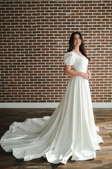 "She's beautiful"- Bashful. Margene's has a beautiful selection of dresses that make your Disney dreams come true! Modest Wedding Dresses Mermaid, Elegant Wedding Dress Modest, Modest Bride Dress, Simple Modest Wedding Dresses, Modest Wedding Dress Mermaid, Modest Wedding Dress Lace, Lds Wedding Dresses, Modest Bridal Dresses, Modest Lace Wedding Dresses