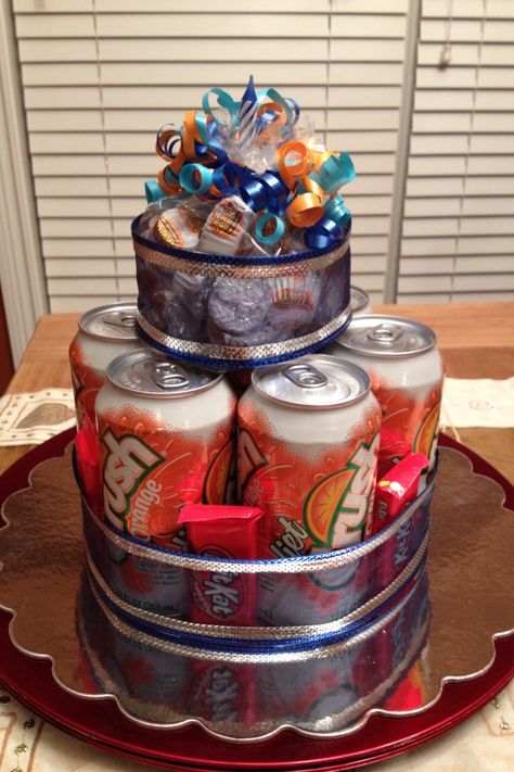 Birthday "Cake"!    My take on this popular idea.  This is a great alternative to traditional cake.  It's easy, inexpensive, and completely customizable, making the recipient feel extra special knowing someone took the time to put together a few of their favorite things. Soda Can Cake Tower, Can Cake Tower, Soda Can Cake, Candy Birthday Cakes, Hamper Ideas, Cake Tower, Candy Birthday, Traditional Cakes, Birthday Thank You