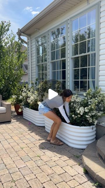 Abby Kulp  DIY | DESIGN on Instagram: "🪴 Nothing adds more charm than planters! #AD These planters look amazing painted in Swiss Coffee from @behrpaint ‘s Curb Appeal Collection!!! I absolutely LOVE that the collection takes the guesswork out of exterior paint color selection. 😅 Let’s face it - choosing a paint color can be the hardest part of a project! 🙌🏼🙌🏼" Front Yard Planter Ideas, Big Planters Outdoor Ideas, Courtyard Bungalow, Patio Planter Ideas, Front Yard Planters, Porch Goals, Planter Box Ideas, Decorate House, Improve Curb Appeal