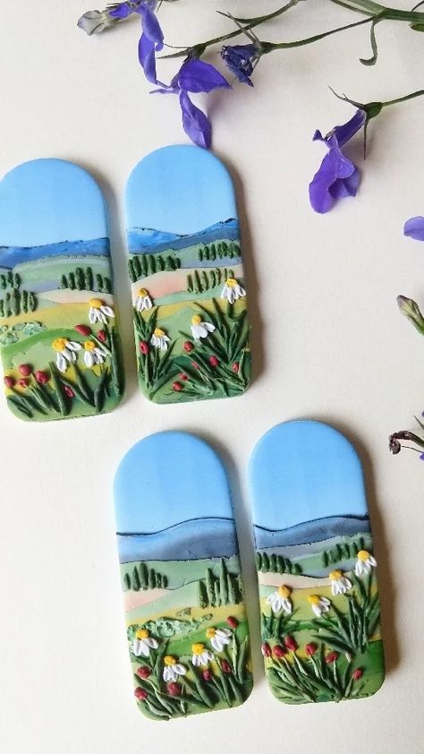 theclayquisit on Instagram: Perspective landscape with layers of mountains, hills, and some wild flowers in the front. Nice pair for earrings for summer. 🌿🌞💕… Polymer Clay Landscape, Clay Mountain, Clay Landscape, Perspective Landscape, Earrings For Summer, Polymer Creations, Clay Painting, Polymer Clay Painting, Clay Inspo