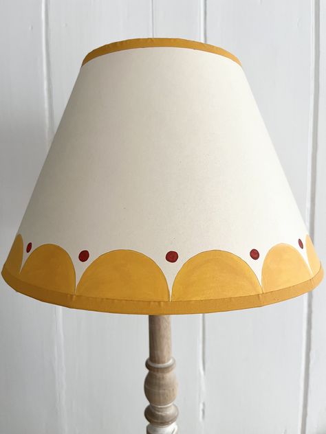 "Add a pop of colour to a room with these fun scallop and dot hand made and hand painted lampshades.  As they are bespoke, the colours can be changed to suit a room / colour scheme. This particular lampshade has been painted with Farrow & Ball's \"Dutch Orange\".  The lampshade measures 30cm diameter at the bottom, and is suitable for UK light fittings on table lamps or ceiling lights. It is made using paper with backing that has been treated for UV stabilisation and fire resistance." Cute Lamp Shade, Hand Painted Lamp Shade, Lamp Shade Painting Ideas, Eclectic Lampshade, Hand Painted Lampshade, Painted Lampshade Diy, Lampshade Painting, Paint Lampshade, Painted Lamp Base