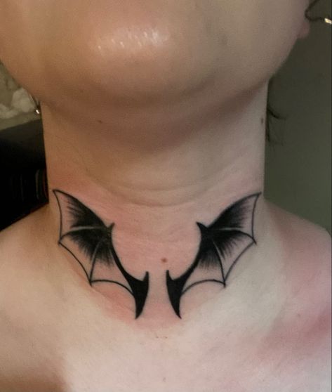 bat wings neck tattoo @pandor.uhh on instagram #bat #wings #tattoo #battattoo #wingstattoo #necktattoo #americantraditionaltattoos #inkspo #tattooideas #aesthetic #tiktok #goth Bat Wing Tattoo On Neck, Bats Neck Tattoo, Bat Wings Tattoo Design, Bat Neck Tattoos Women, Bat Wings Tattoo Knee, Bat Wings Neck Tattoo, Bat Wing Neck Tattoo, Wings Throat Tattoo, Batwing Tattoos