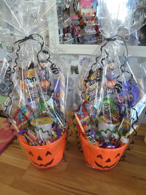 Halloween sweet bucket hampers made to order for specific ages Halloween Treat Bucket Ideas, Halloween Hamper Ideas, Autumn Hamper Ideas, Halloween Candy Bucket Ideas, Sweet Hamper Ideas Gift, Halloween Sweet Bags, Halloween Bucket Ideas, Halloween Hamper, Halloween Gift Basket Ideas