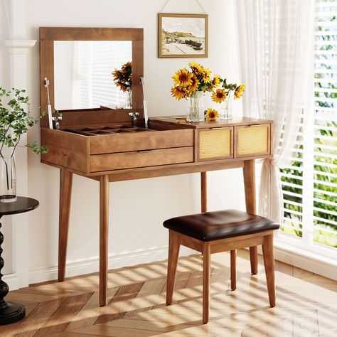 Elevate your beauty routine with this versatile makeup vanity featuring a flip-top mirror that easily conceals for a functional tabletop. The set includes three drawers two large for skincare and a compartmentalized third drawer for smaller items providing ample storage. The elegant woven rattan design and metal handles enhance usability, while the PU-covered stool ensures comfort. Built with solid wood legs and anti-slip feet for stability, this vanity keeps all your beauty essentials organized and accessible. Perfect for bedroom! Wood Makeup Vanity, Makeup Vanity Table, Mirror Drawers, Makeup Vanity Set, Mirror Stool, Mdf Panel, Makeup Desk, Vanity Table Set, Makeup Table Vanity