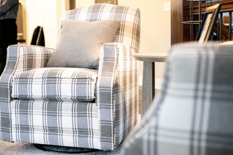 Buffalo plaid grey and white swivel chairs with grey and buffalo plaid throw pillows to add seating in the large open living room with dining and kitchen behind next to stairs leading to the basement! Adorable traditional home design and traditional home decor ideas tips and tricks! Follow the link to get inspired! Farmhouse Livingrooms, Traditional Home Decor Ideas, Buffalo Check Chair, Plaid Living Room, Dark Grey Sectional, New Old House, White Swivel Chairs, Plaid Chair, Norwalk Furniture