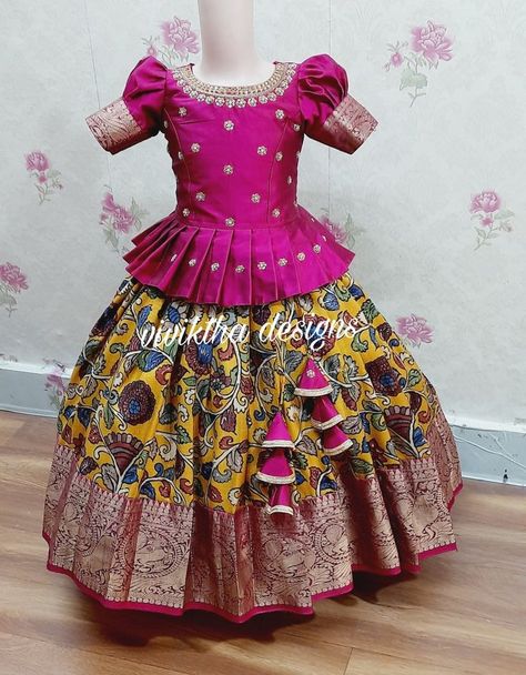 Kalamkari kanchi pattu lehanga blouse | Girls frock design, Kids blouse designs, Kids designer dresses Indian Dresses For Kids, Cotton Frocks For Kids, Blouse Peplum, Kids Dress Collection, Kids Blouse Designs, Kids Lehenga, Kids Frocks Design, Kids Dress Wear