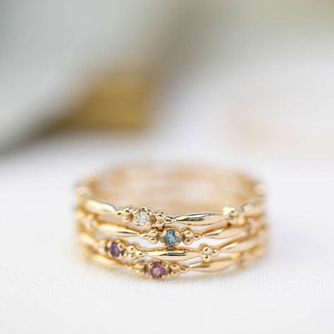 This dainty birthstone stackable ring is unlike any other, the band has a unique design all around which gives a bit of antique feel. Perfect gift for February birthdays! * Stock size: US 7 (resizable to 5-8) * Genuine 1.5mm amethyst * Band width: ≈1.75mm * Setting size: ≈2mm * Material: 14k solid yellow gold (rose gold or white gold option available) * Made of 100% recycled precious metal and ethically sourced gemstone * Comes in a gift box with a bow ready for gifting * Handmade with love and Aquamarine Stacking Ring, Aquamarine Solitaire Ring, Citrine Birthstone, Stackable Birthstone Rings, Aquamarine Birthstone, Garnet Birthstone, Topaz Birthstone, Amethyst Birthstone, Diamond Stacks