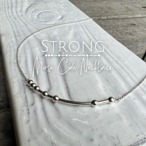 Not sure what to get your grad? The STRONG Morse Code Necklace is the perfect daily reminder that they can handle whatever life throws at them. STRONG Morse Code Necklace: https://www.trishaflanagan.com/products/strong-morse-code-necklace Code Morse, Morse Code Necklace, Morse Code, Polish Silver, Daily Reminder, To My Daughter, Necklaces Bracelets, Necklace Lengths, Silver Bracelet