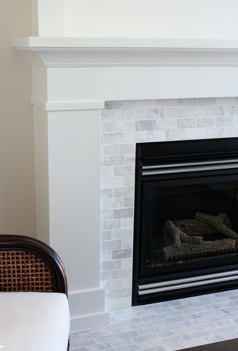 White Painted Fireplace with Marble Subway Tile - The Makeover Details - SatoriDesignforLiving.com Herringbone Fireplace Surround, Fireplace With Marble, Subway Tile Fireplace, White Painted Fireplace, Herringbone Fireplace, Marble Subway Tile, Painted Fireplace, Fireplace Redo, Fireplace Update