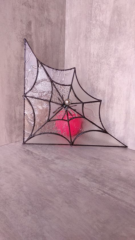 This stunning Spider's Web Stained Glass Corner Piece is a beautiful and unique addition to any home, porch, or garden decor. Handcrafted with natural textured glass, this piece features a intricate spider web design with a spider in the center. Gift for him her bff. Gifts under 50. Perfect for adding a touch of charm and elegance to any space, this corner piece is a true work of art. And with its thoughtful design and natural materials, it also makes a wonderful Father's Day gift that will be t Spider Web Stained Glass Pattern, Spider Stained Glass Pattern, Fused Glass Spider Web, Stained Glass Spider Web Corner, Glass Spider, Stained Glass Spider Web, Stained Glass Spider, Making Stained Glass, Christmas Window